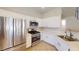 Well-equipped kitchen with stainless steel appliances and ample cabinet space at 76 Stock Option St # 2, Henderson, NV 89074