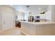 Bright kitchen with quartz counters, stainless appliances, and adjoining breakfast nook at 76 Stock Option St # 2, Henderson, NV 89074