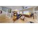 Spacious living room with staircase, tiled floors, recessed lighting, and modern decor at 76 Stock Option St # 2, Henderson, NV 89074