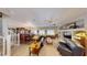 Open concept living room featuring dining and Gathering area with lots of natural light at 76 Stock Option St # 2, Henderson, NV 89074