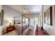 Beautiful main bedroom with a four-poster bed and access to a private balcony at 76 Stock Option St # 2, Henderson, NV 89074