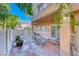 Comfortable outdoor seating on a brick patio with a covered area, ideal for entertaining guests at 76 Stock Option St # 2, Henderson, NV 89074