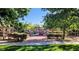 Community playground with slides, swings, and climbing structures at 76 Stock Option St # 2, Henderson, NV 89074
