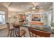 Gourmet kitchen boasting a large island, black countertops, and stainless steel appliances at 7730 Brambly Creek Ct, Las Vegas, NV 89129
