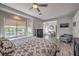 Bright main bedroom features wood floors, neutral paint and plenty of windows at 7730 Brambly Creek Ct, Las Vegas, NV 89129