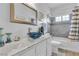 Bathroom featuring a vessel sink, granite countertops, and updated shower at 7929 Ben Hogan Dr, Las Vegas, NV 89149