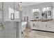 Modern bathroom with dual sinks, walk-in shower, and stylish fixtures at 7929 Ben Hogan Dr, Las Vegas, NV 89149