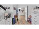 Bright bedroom featuring decor, white dresser and storage, and an inviting open doorway at 7929 Ben Hogan Dr, Las Vegas, NV 89149