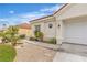 Attractive single-story home with low maintenance desert landscaping and a two-car garage at 7929 Ben Hogan Dr, Las Vegas, NV 89149