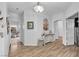 Bright hallway with wood floors and neutral paint at 7929 Ben Hogan Dr, Las Vegas, NV 89149