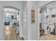 Open hallway leading to a laundry room and living area, showcasing the home's layout at 7929 Ben Hogan Dr, Las Vegas, NV 89149