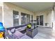 Covered patio with comfortable seating, perfect for outdoor relaxation and entertaining with heaters at 7929 Ben Hogan Dr, Las Vegas, NV 89149