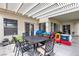 Covered patio with outdoor dining area, perfect for enjoying meals and gathering with Gathering at 7929 Ben Hogan Dr, Las Vegas, NV 89149