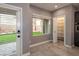 Bright breakfast nook with backyard views and a walk-in pantry near the modern kitchen at 852 Colina Alta Pl, Las Vegas, NV 89138