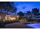 Relaxing outdoor space featuring a pool and lush garden landscape at 8620 W La Madre Way, Las Vegas, NV 89149