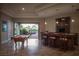 Entertainment room with a pool table and custom bar area at 8620 W La Madre Way, Las Vegas, NV 89149