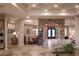 Spacious living room with archway details and an open floor plan; ideal for entertaining at 8620 W La Madre Way, Las Vegas, NV 89149
