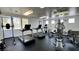 Fitness center with treadmills, weight machines, and natural light at 950 Seven Hills Dr # 2014, Henderson, NV 89052