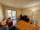 Cozy living room with a sliding glass door leading to an outdoor patio at 950 Seven Hills Dr # 2014, Henderson, NV 89052