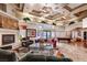 Spacious living room features a fireplace, ceiling fans, and lots of natural light at 950 Seven Hills Dr # 2014, Henderson, NV 89052