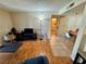 Inviting living room featuring neutral paint and a mix of tile and laminate flooring at 950 Seven Hills Dr # 2014, Henderson, NV 89052