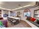 Meeting room with a long table, cushioned window seating, and built-in shelving at 950 Seven Hills Dr # 2014, Henderson, NV 89052