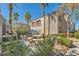 Community outdoor grilling area featuring seating and well-maintained landscaping for residents to enjoy at 950 Seven Hills Dr # 2014, Henderson, NV 89052