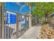 View of the community pool gate with social distancing guidelines posted at 950 Seven Hills Dr # 2014, Henderson, NV 89052