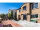 Backyard featuring a concrete patio and slider doors on a two-story home with a stucco exterior at 9856 Chief Sky St, Las Vegas, NV 89178