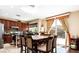 Modern kitchen with an island, stainless steel appliances, and sliding glass doors at 9856 Chief Sky St, Las Vegas, NV 89178
