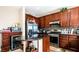 Well-equipped kitchen featuring an island, modern appliances, and ample cabinet space at 9856 Chief Sky St, Las Vegas, NV 89178