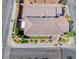 High-angle aerial shot displays a well-maintained home with a tile roof, landscaped yard, and street access at 10025 San Floriano St, Las Vegas, NV 89178
