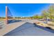 Basketball court with two hoops at a park with walking paths and desert landscaping at 10025 San Floriano St, Las Vegas, NV 89178