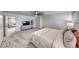 Primary bedroom with neutral carpet and natural light at 10025 San Floriano St, Las Vegas, NV 89178