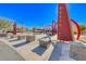 playground with climbing structures at community park on a sunny day at 10025 San Floriano St, Las Vegas, NV 89178