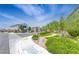 Charming street view showcases well-maintained landscaping, sidewalks, and homes in a peaceful community setting at 10025 San Floriano St, Las Vegas, NV 89178