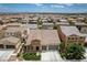 Aerial view of a lovely neighborhood with terracotta-roofed homes at 1005 Old Creek Way, North Las Vegas, NV 89084
