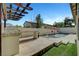 Outdoor kitchen and pristine pool area perfect for summer entertaining at 1005 Old Creek Way, North Las Vegas, NV 89084