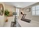 Bright exercise room with exercise bike and treadmill at 1005 Old Creek Way, North Las Vegas, NV 89084