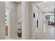Bright hallway with tile floors and decorative artwork at 1005 Old Creek Way, North Las Vegas, NV 89084