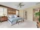 Serene main bedroom with a ceiling fan, a decorative accent wall, and a calming atmosphere at 1005 Old Creek Way, North Las Vegas, NV 89084