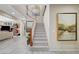 Open staircase showcasing modern design and neutral color palette at 1005 Old Creek Way, North Las Vegas, NV 89084