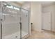 Bathroom featuring glass shower and tile flooring at 1055 Fish Pond Ave, Henderson, NV 89014