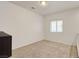Bedroom with carpet floors and natural light from a window at 1055 Fish Pond Ave, Henderson, NV 89014