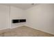 Upstairs room with carpet floors and a modern floating TV stand at 1055 Fish Pond Ave, Henderson, NV 89014