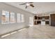 Open floor plan featuring kitchen, living room, and outdoor access at 1055 Fish Pond Ave, Henderson, NV 89014