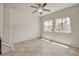 Bright living room with two windows overlooks backyard play area at 1055 Fish Pond Ave, Henderson, NV 89014