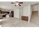 Open floor plan featuring the kitchen, living room, and stairs at 1055 Fish Pond Ave, Henderson, NV 89014