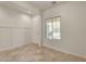 Bright, airy living room with tile flooring and a neutral color palette, ready for personal touches at 1055 Fish Pond Ave, Henderson, NV 89014