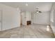 Open concept living room with backyard access and neutral color palette at 1055 Fish Pond Ave, Henderson, NV 89014